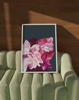 Balanced fine art print of pink flowers showcased on green couch.