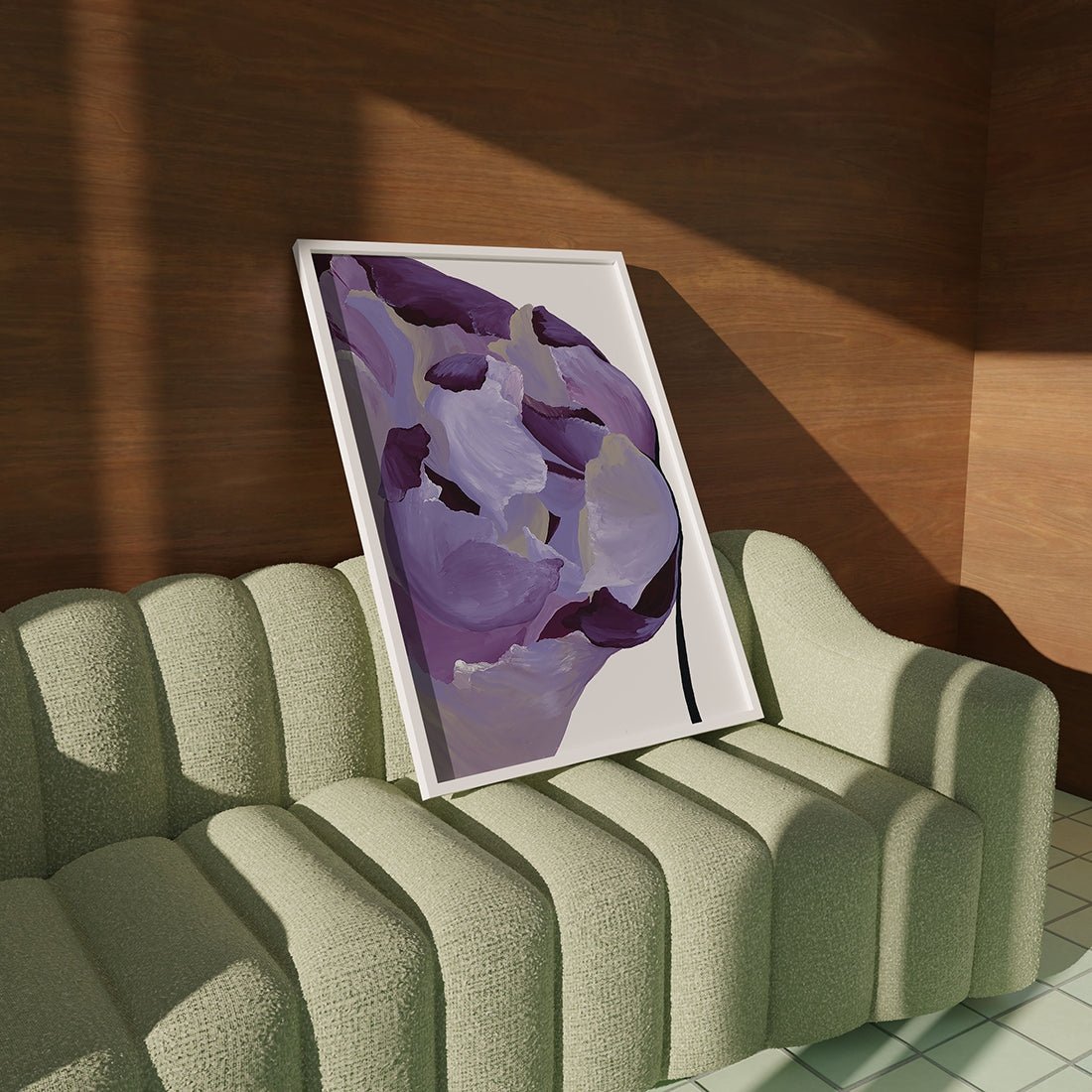 Empire product with purple flower and muted gold accents on green couch for eclectic interiors.