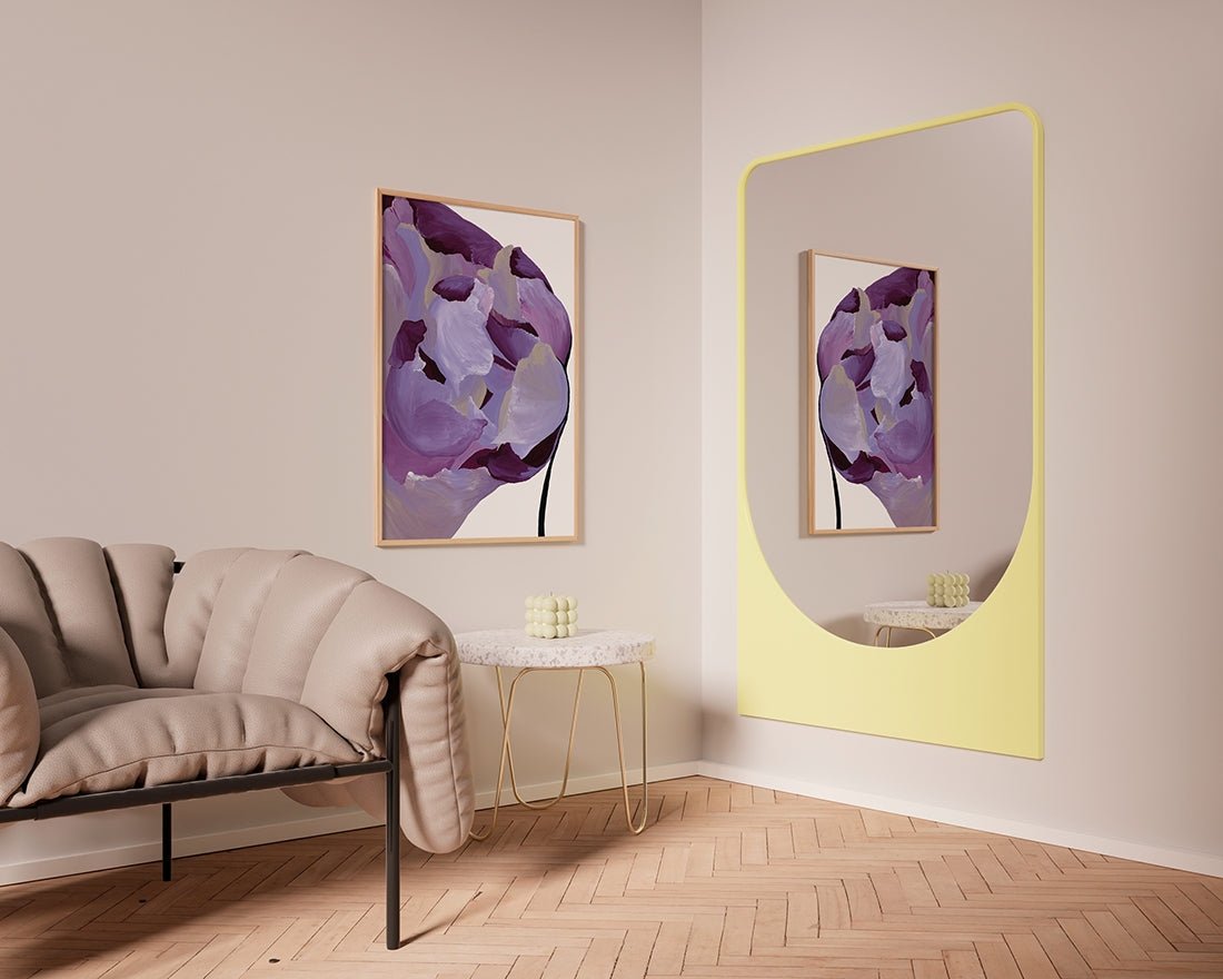 Empire living room with purple tones, muted gold chair, and eclectic painting on wall.