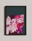 Balanced premium art print featuring pink flowers framed on a wall.